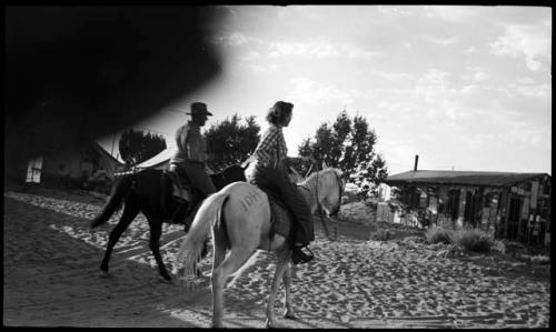 Jo and Evelyn on horseback.