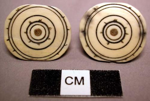 Ear pendants-incised, blackened, concentric circle motif