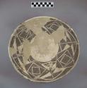 Bowl with brown geometric design