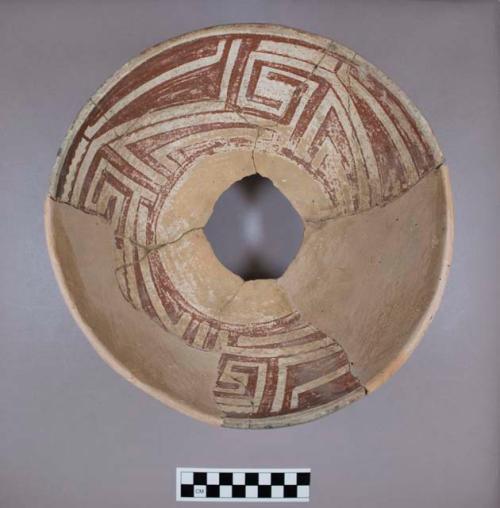 Bowl with geometric brown on white design