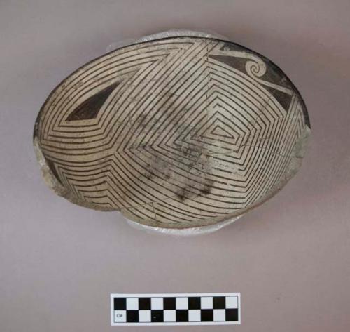 One-half bowl with linear/scroll design