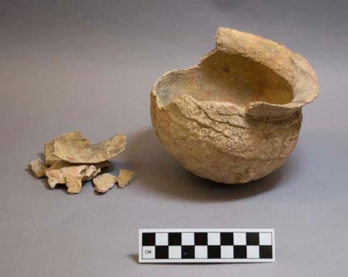 Ceramic partial jar and sherds, corrugated neck, rim and shoulder