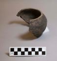 Sherd of small corrugated bowl