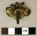 Fragmentary gold plated copper bird's head