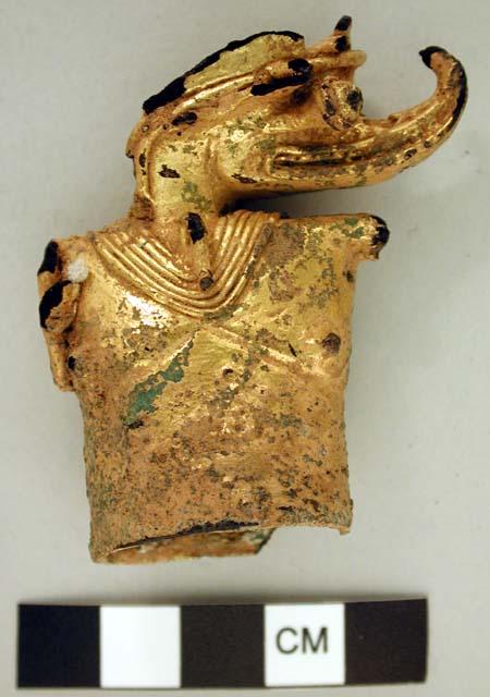 Gold and carbon staff head - animal figure