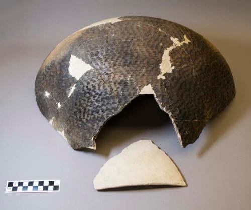 (illegible) sherds of large corrigated bowl