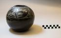 Ceramic black-on-black bowl:  avanyu motif