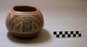 Polychrome ceramic bowl: geometric motif