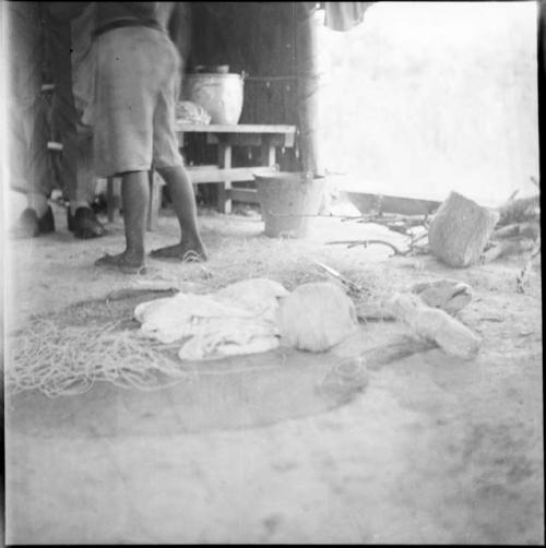 Economic life/Arts and crafts: view of the floor within a hut with crafts