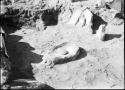 Awatovi, mano and metate on floor of room