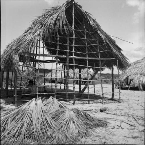 Houses and house buildings: constructing a building, view of side poles