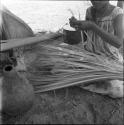 Work and techniques: woman working on thatch