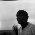 Portraits of people: blurry photo of man in white shirt