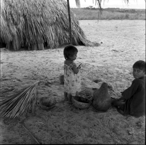 Portraits of people: toddler standing around bowls