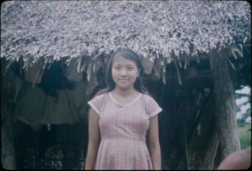 Young girl wearing patterned dress