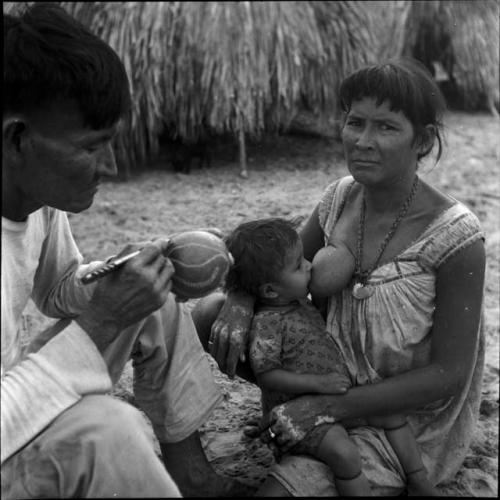 Portraits of people: woman breastfeeding