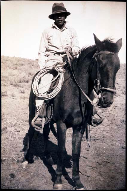 Leland Dennis riding a horse