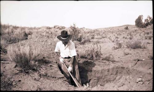 Jay Hooten digging a hole