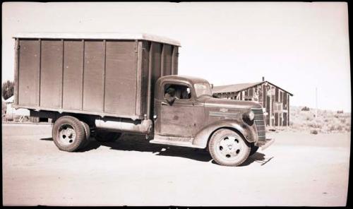 The big truck taking off with crates and boxes