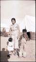 Hopi woman with two children