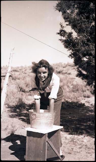 Dorothy Newton doing laundry