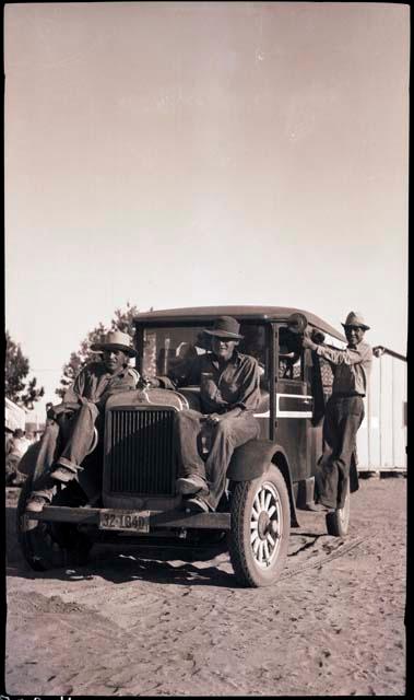 Three Hopi crew members on the Dodge truck