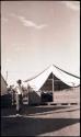 Marion Hutchinson in front of the pottery tent