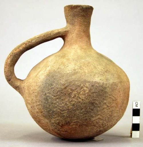 Pottery jar, handle on side, red, stamped