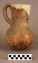 Large plain brow pottery pitcher (restored)