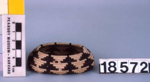 Small oval basket, flat base, inverted rim--diameter of rim 1.25 - 2 in.