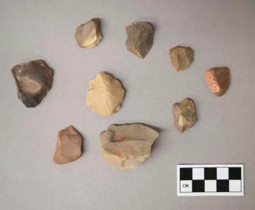 Flint scrapers, including tan, grey, brown, pink and cream colored stone, some contain cortex