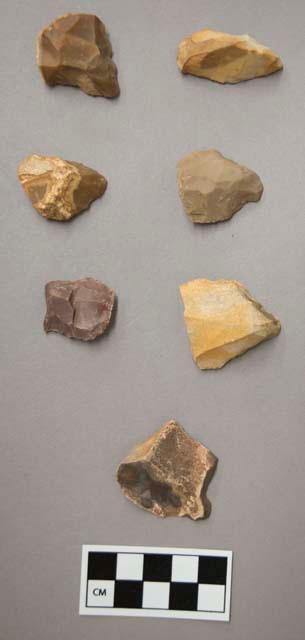 Flint scrapers, including cream, tan, grey, brown and purple colored stone, some contain cortex