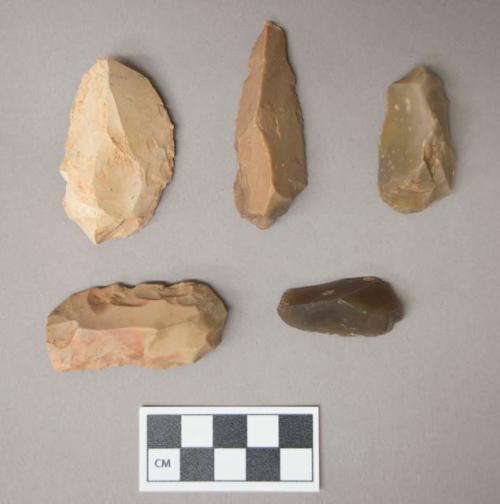 Flint scrapers, including tan, cream, grey and brown colored stone