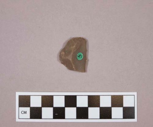 Flint endscraper; notched on obverse side; brown colored stone