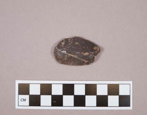 Flint endscraper; brown colored stone