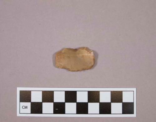 Flint endscraper; tan colored stone