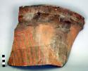 Large fragment of trucated conical vase - red ware; geometric design