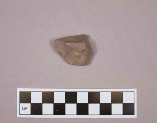 Flint endscraper; tan colored stone