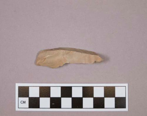 Flint blade; sidescraper; tan colored stone