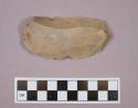 Flint blade with broad tip; retouched; tan colored stone