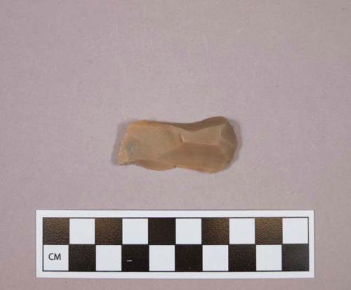 Flint endscraper on blade; tan colored stone