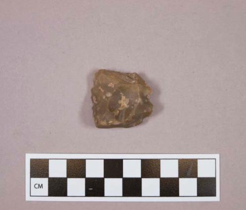 Flint flake; scraper; brown colored stone