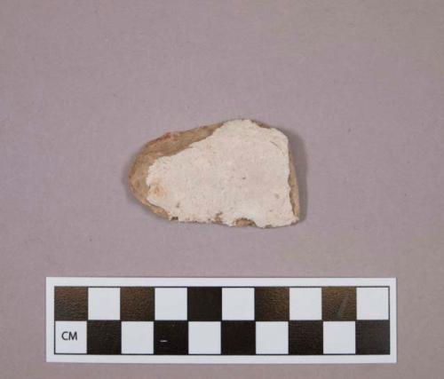 Flint endscraper with cortex; tan colored stone