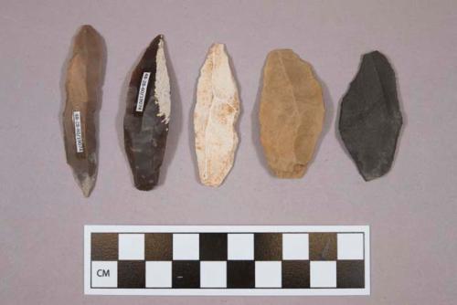 Flint blades, including tan, grey, brown and cream colored stone