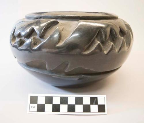 Heavily carved black Bowl