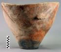 4 large fragments of vessel of red hand smoothed ware