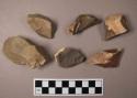 Flint flakes and burins, including tan, brown, grey and red colored stone, some contain cortex