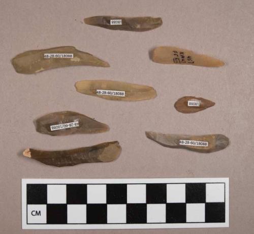 Flint blades, including tan, brown and grey colored stone, some contain cortex