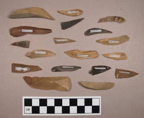 Flint blades, including tan, cream, brown, red and grey colored stone