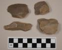 Notched flint flakes; one with cortex; tan-colored stone